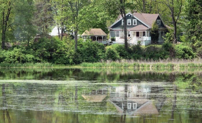 House on a lake with mold