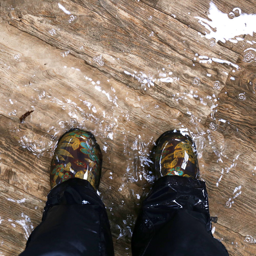 boots in puddle of water